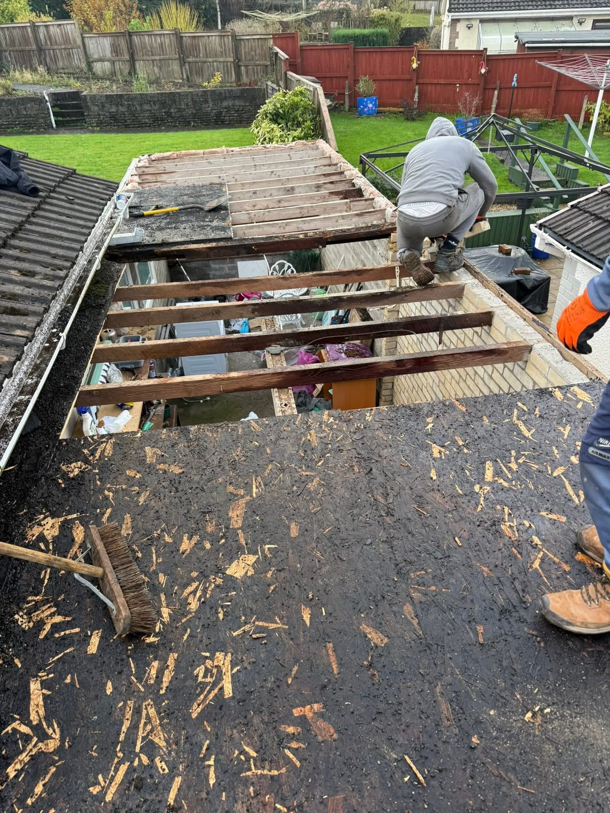 Flat roofing Glasgow: failed flat roof stripped back to the joists