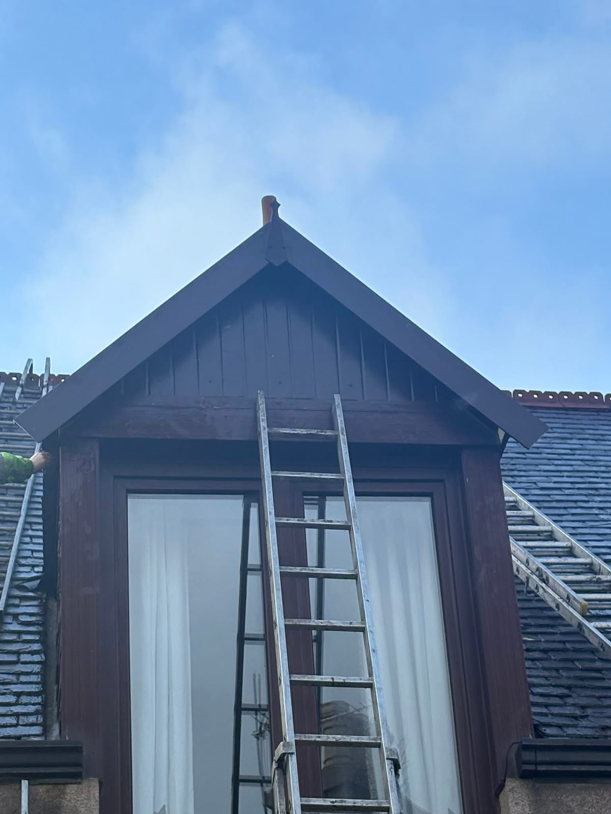 Property maintenance in Glasgow: timber dormer gable repaired and redecorated