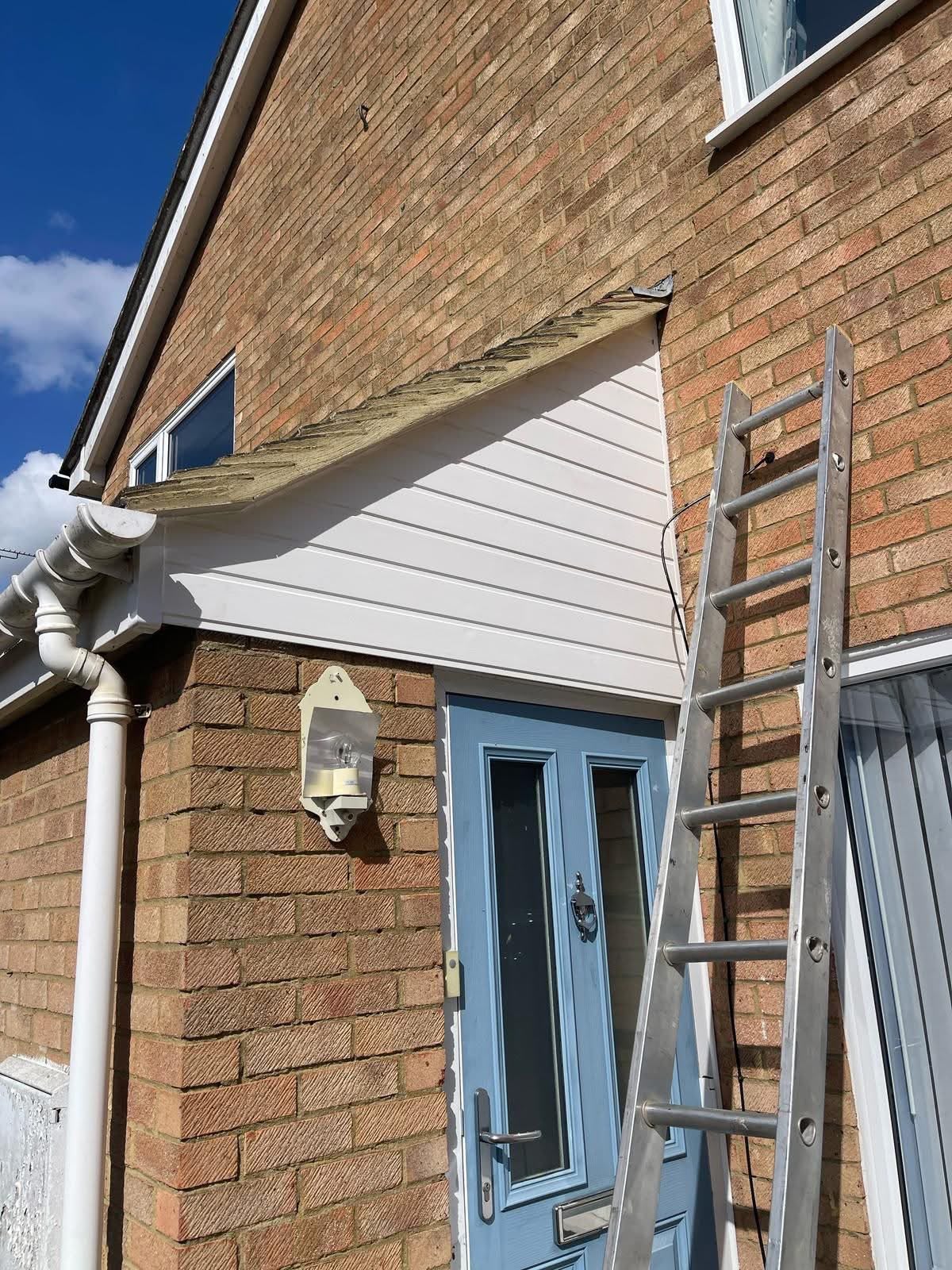 uPVC fascia, soffit and guttering in Glasgow: new white uPVC soffit and fascia fitted above a front entrance