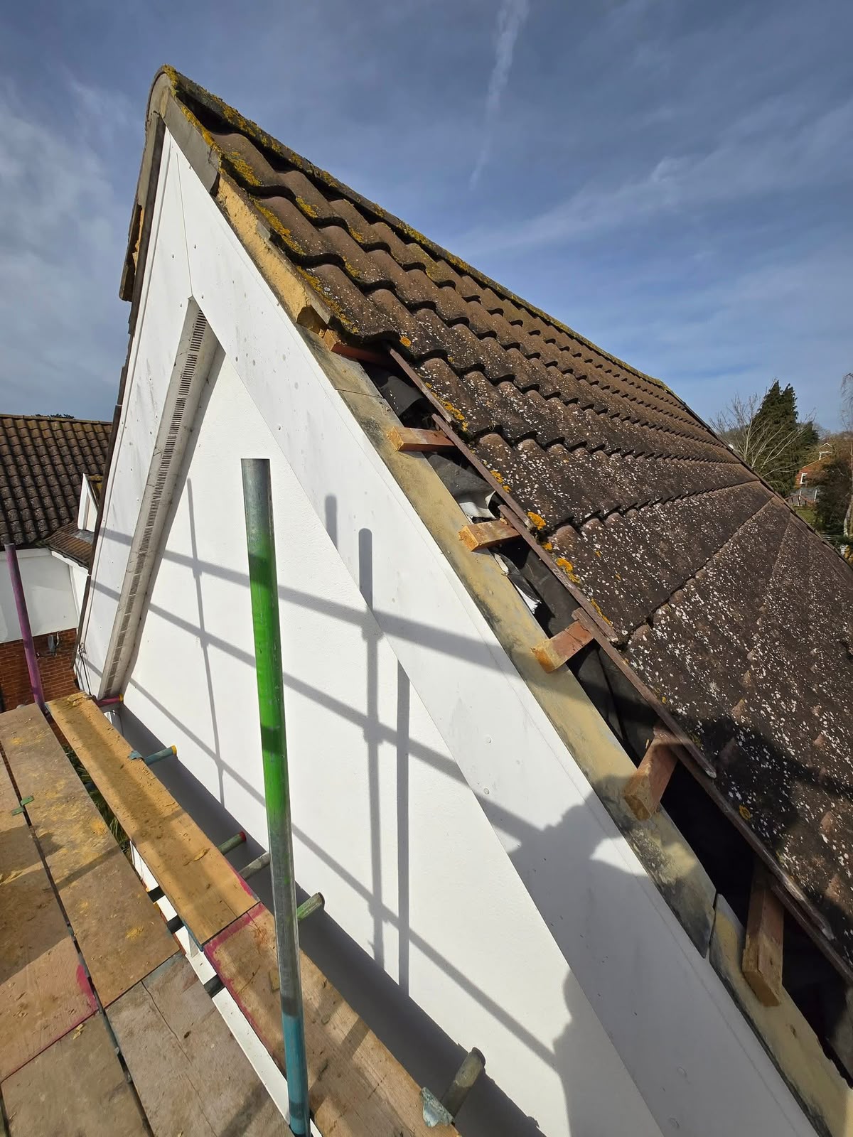 uPVC roofline Glasgow: gable verge stripped ready for new bargeboard