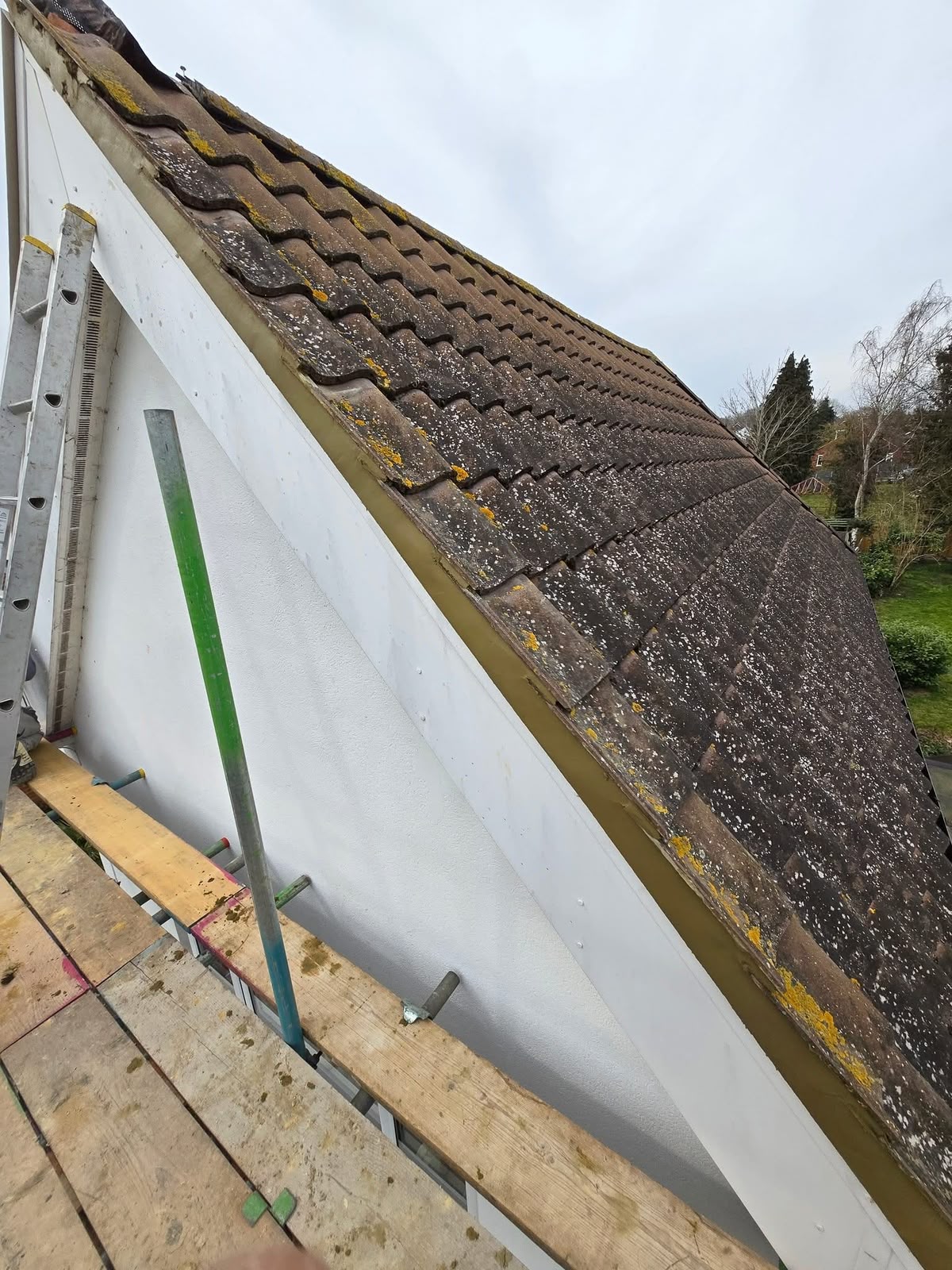 uPVC roofline Glasgow: new white bargeboard fitted to a gable verge